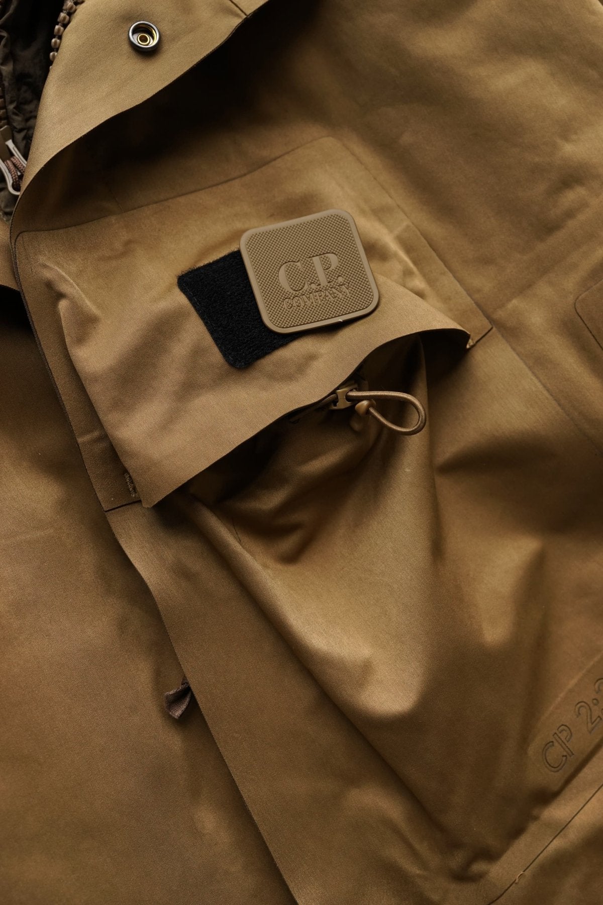 C.P. COMPANY - A.A.C. DOWN FISHTAIL PARKA - CUMIN